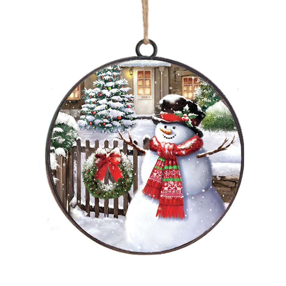 ORN METAL DISC 4" A SNOWMAN IN FRONT OF A SNOW-COVERED FENCE