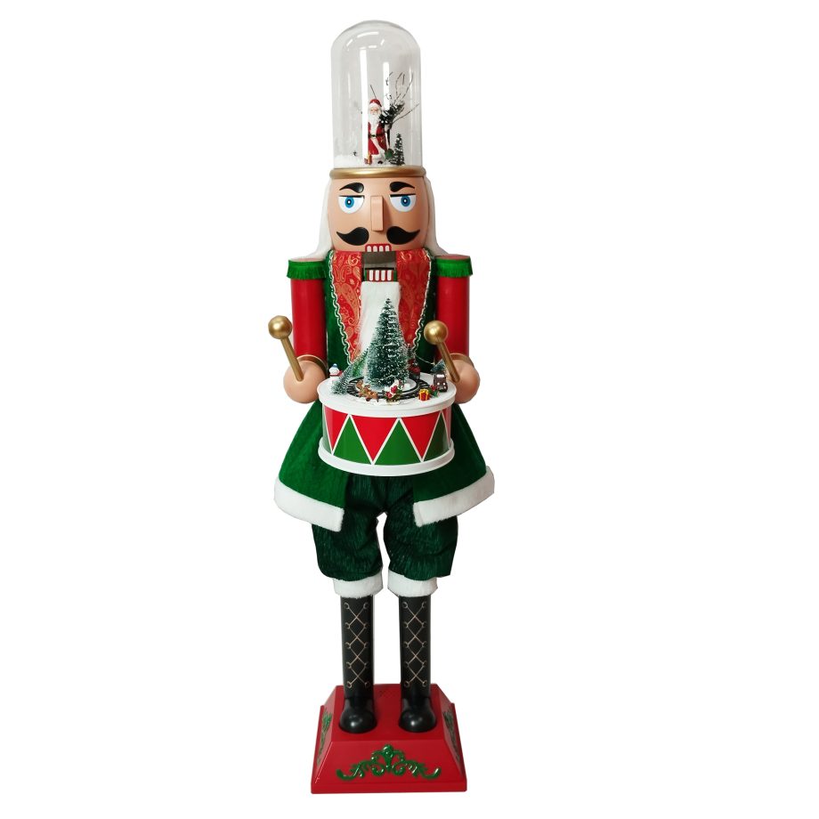 NUTCRACKER STANDING GREEN/RED 45" TRAIN ON DRUM &SNOW GLOBE HAT W/ MOVEMENT & MUSIC